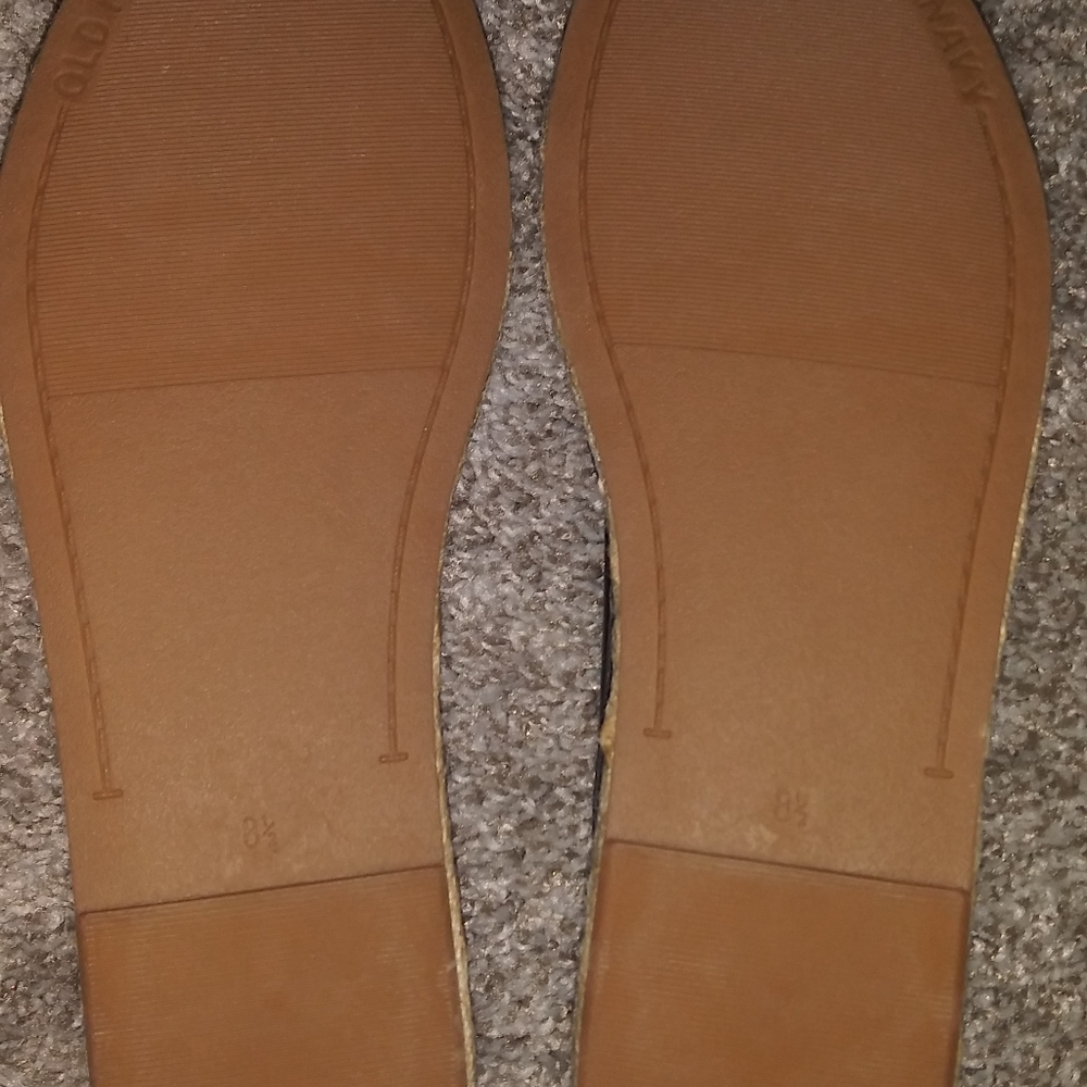 Black leather slip ons